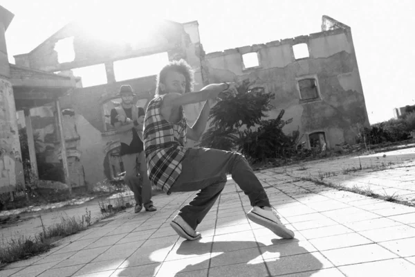 Energetic young hip hop street dancer