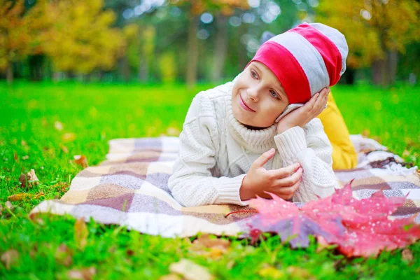 Happy Cute Boy Talking Phone Autumn Park Green Grass Yellow — Stock Photo, Image