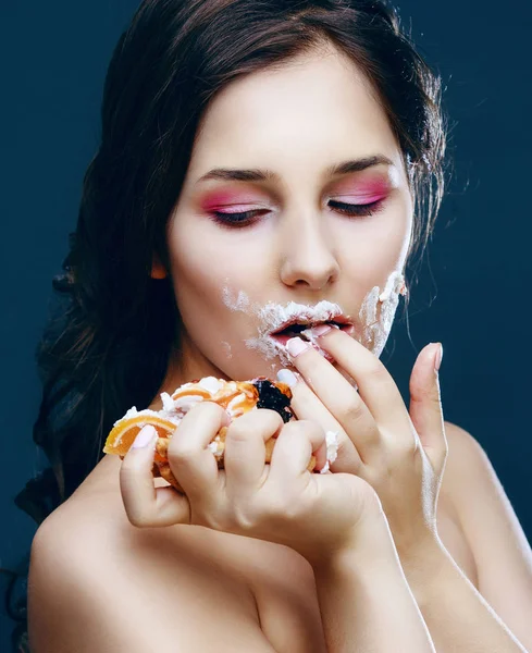 Beautiful Model Eating Dessert Isolated Dark Studio Background — Stok fotoğraf