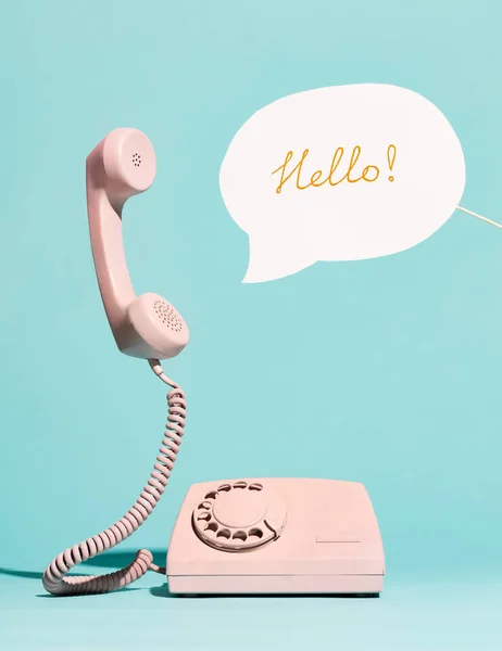 Pink Vintage Phone Speech Bubble Saying Hello — Stock Photo, Image