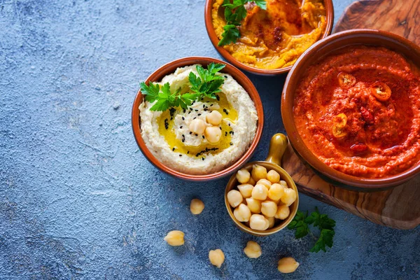 Hummus Zucca Hummus Pepe Rosso Hummus Lenticchie Sul Tavolo Legno — Foto Stock