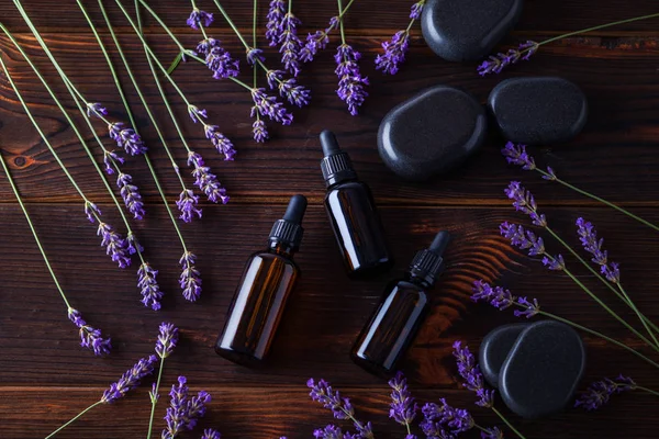 Herbal oil and lavender flowers