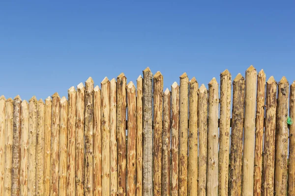 Wooden Fence Made Sharpened Planed Logs — Stock Photo, Image