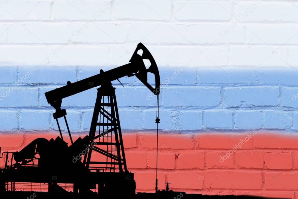 Oil drilling on the background of the flag of the Russian Federation