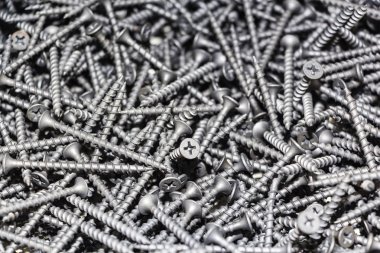 merkezi odak. siyah vida doku arka plan closeup, modern metal karışımı çeşitlilik.