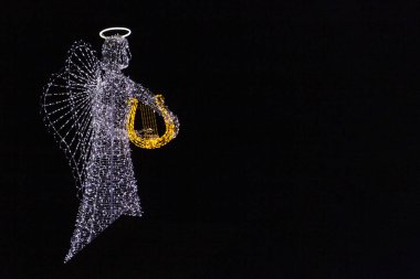 Noel süsleri, melek figürü çeşitli ışıklar.