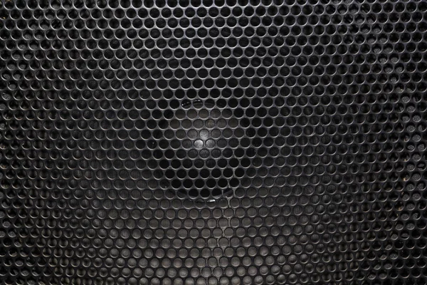 Abstract zwart metallic mesh textuur patroon voor achtergrond. Industriële achtergrond. De spreker van een muzikale column — Stockfoto