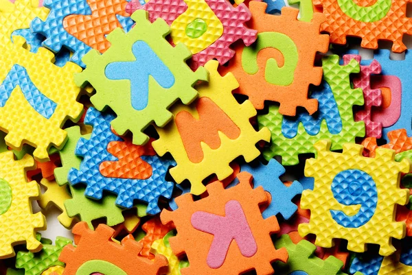 Bovenaanzicht Van Gekleurde Educatieve Puzzels Met Letters — Stockfoto