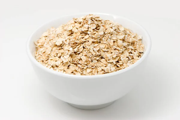 White Bowl Uncooked Oatmeal White Surface — Stock Photo, Image