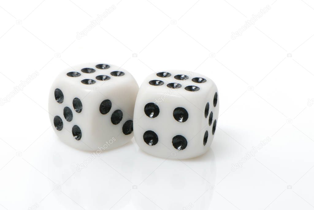 White dices scattered on white background