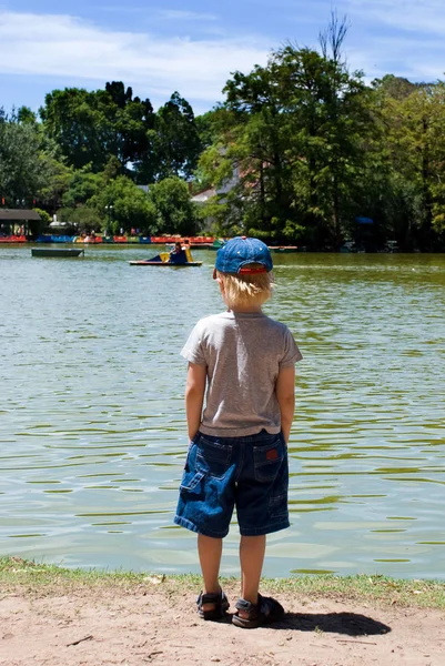 Happy Little Boy Standing Lake Green Park Back View — Stock Photo, Image