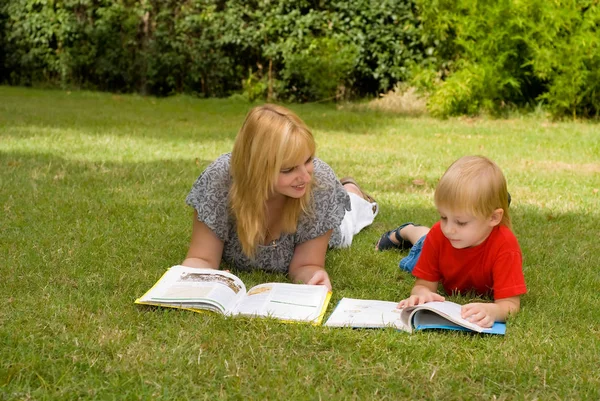 Happy Mother Son Reading Together Grass Park — Stock Photo, Image
