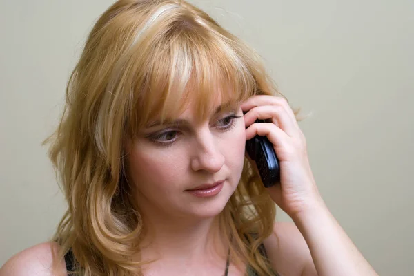 Beautiful Blonde Woman Talking Mobile Phone Posing Light Background — Stock Photo, Image