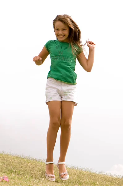 Full Length Portrait Happy Girl Jumping Foggy Background — Stock Photo, Image