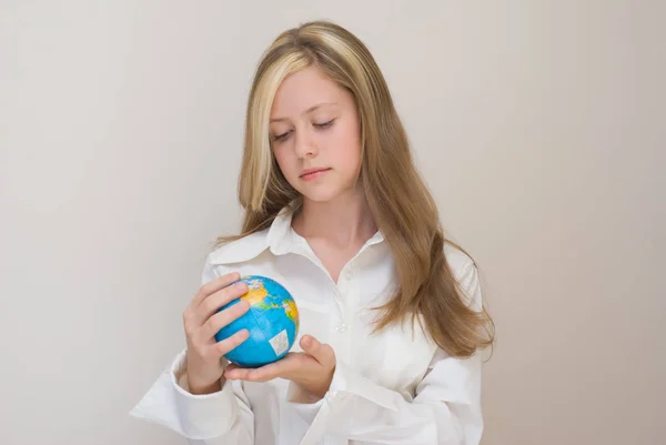 Pretty Teen Girl Wearing White Blouse Holding Globe Standing Light — Stock Photo, Image