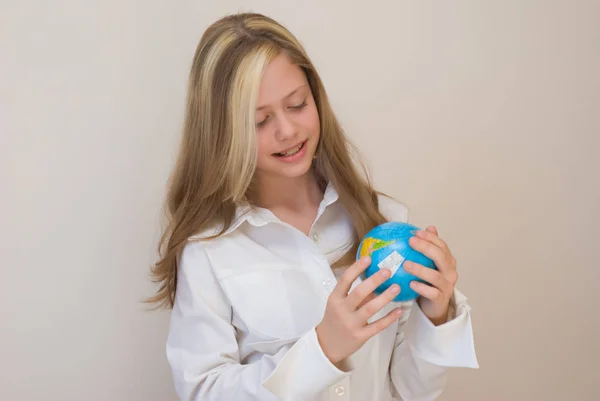 Pretty Teen Girl Wearing White Blouse Holding Globe Standing Light — Stock Photo, Image