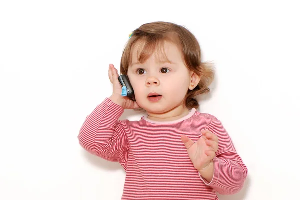 Close Portret Van Mooie Kleine Meisje Praten Telefoon Witte Achtergrond — Stockfoto