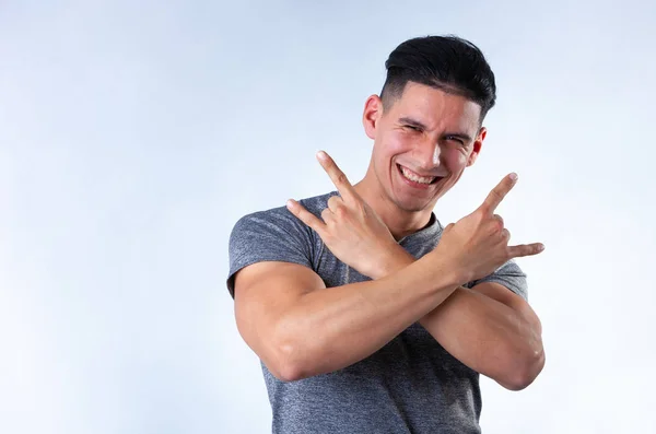 portrait of young attractive man on light background