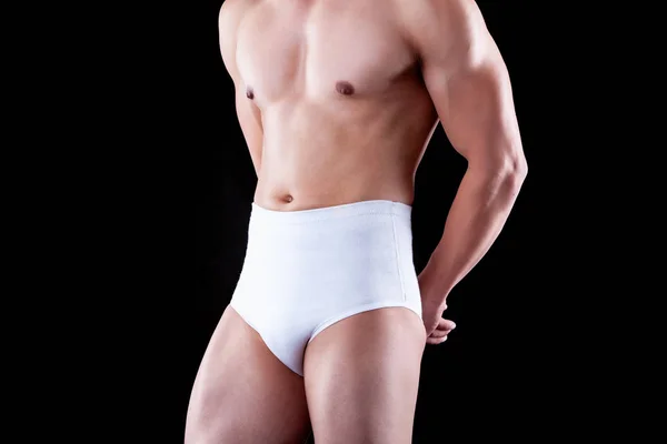 弾性医療ショートパンツの男性胴体 解剖学的サスペンス — ストック写真