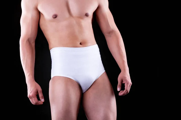 弾性医療ショートパンツの男性胴体 解剖学的サスペンス — ストック写真