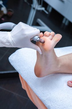 foot cleaning in a beauty salon clipart