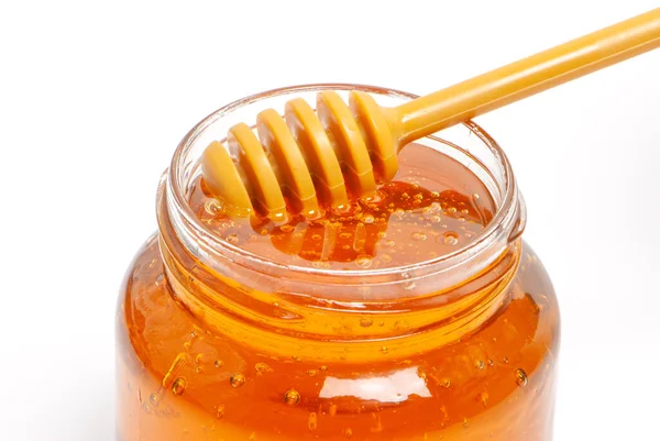 Gouden Bijenhoning Een Glazen Pot Honingdipper — Stockfoto