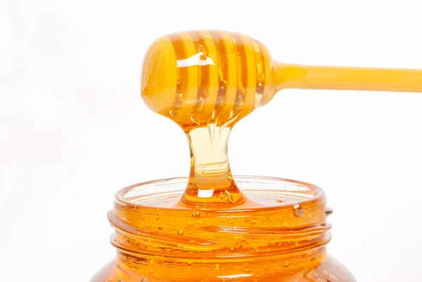 Gouden Bijenhoning Een Glazen Pot Honingdipper — Stockfoto