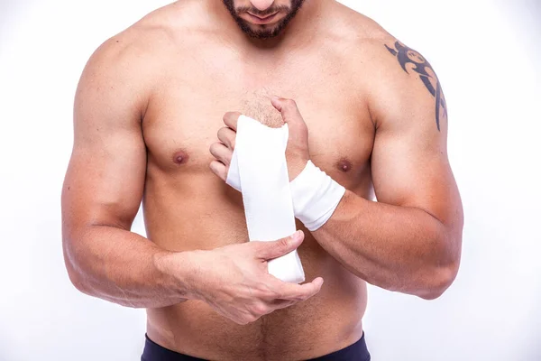 Sporty Man Rewinds His Arms Elastic Bandage — Stock Photo, Image