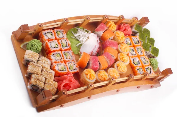 Set Sushi Giapponese Sashimi Supporto Legno Decorativo Scolpito Uno Sfondo — Foto Stock