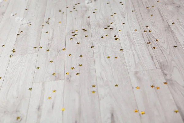 Konfety hvězdy na podlaze — Stock fotografie