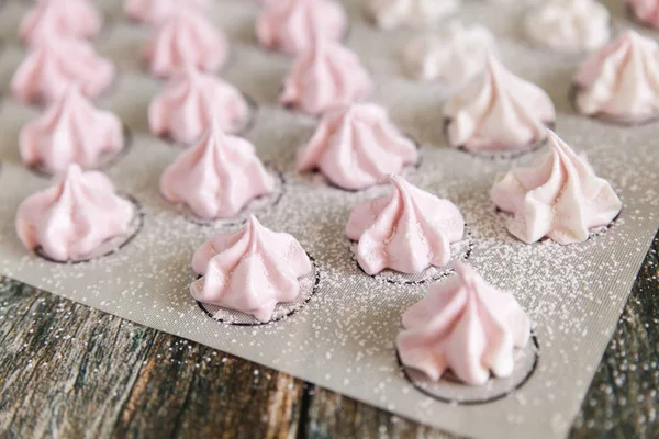Small white and pink meringues or zephyr — Stock Photo, Image