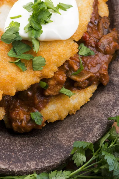 Potato pancakes with meat, vegetable, tomato and parsley — Stock Photo, Image