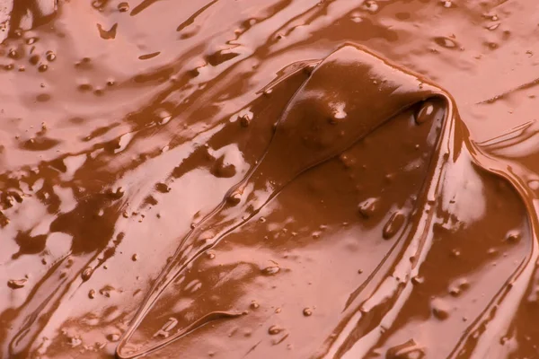 溶かしたチョコレートの背景 クローズアップ画像 — ストック写真
