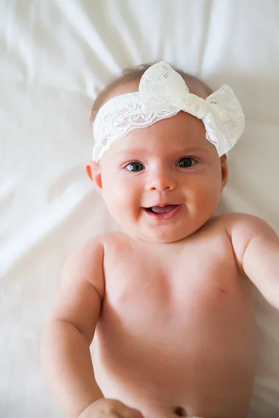 Portrait Funny Little Girl White Bow Her Head — Stock Photo, Image