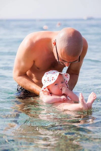 Father Holding His Cute Newborn Daughter Sea — Stock Photo, Image