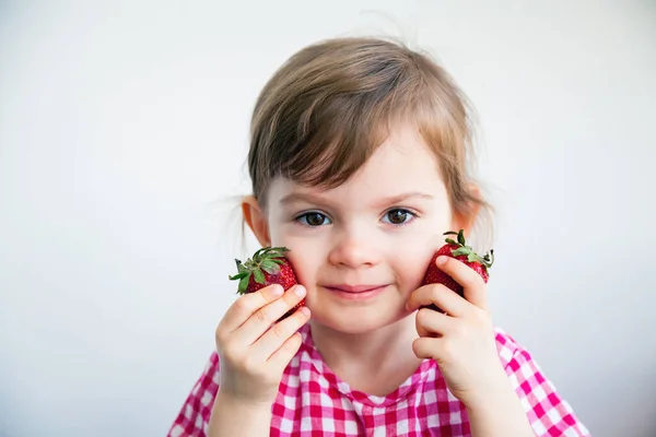 Adorable Little Girl Holding Two Big Strawberries Her Cheeks — Stock Photo, Image