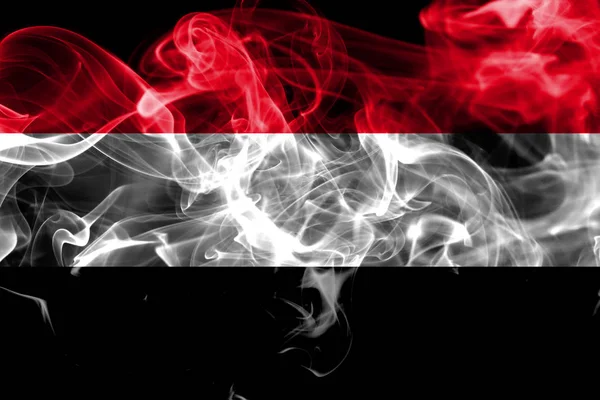 黒の背景にイエメン煙フラグ — ストック写真