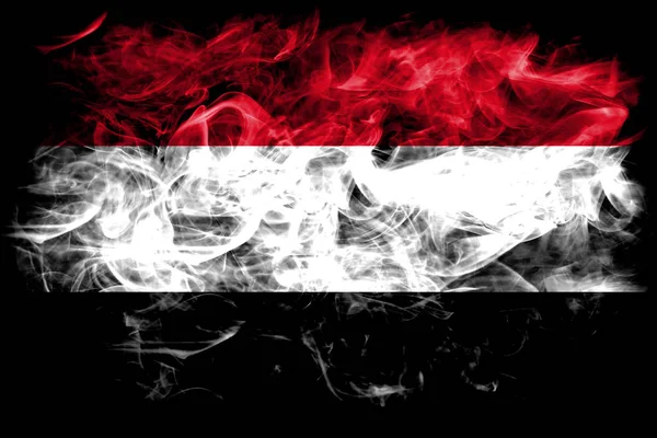黒の背景にイエメン煙フラグ — ストック写真