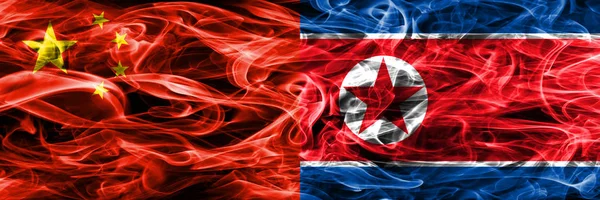 China Corea Del Norte Banderas Humo Colocadas Lado Lado —  Fotos de Stock