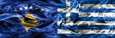 Kosova vs Yunanistan duman bayrakları yan yana yerleştirilmiş