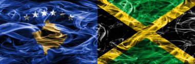 Kosova vs Jamaika duman bayrakları yan yana yerleştirilmiş