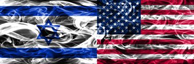 İsrail vs bize bayrakları yan yana yerleştirilmiş duman. İsrail ve ABD bayrağı birlikte