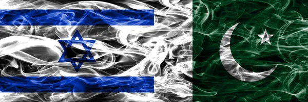 Israel vs Pakistan smoke flags placed side by side. Israeli and Pakistan flag together