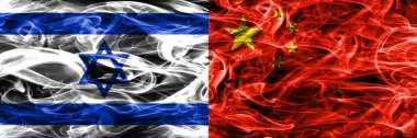 İsrail vs Çin duman bayrakları yan yana yerleştirilmiş. İsrail ve Çin bayrağı birlikte