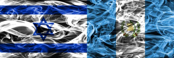 Израиль Против Гватемалы Дымовые Флаги Размещенные Бок Бок Флаг Израиля — стоковое фото