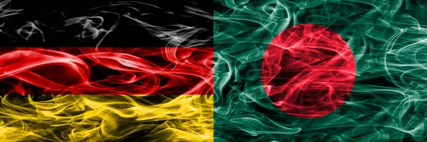 Germany vs Bangladesh smoke flags placed side by side. German and Bangladesh flag together