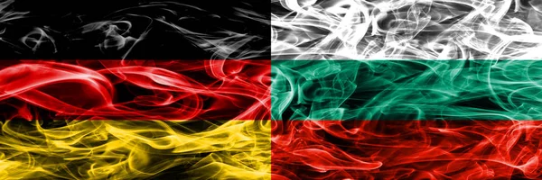Germany vs Bulgaria smoke flags placed side by side. German and Bulgaria flag together