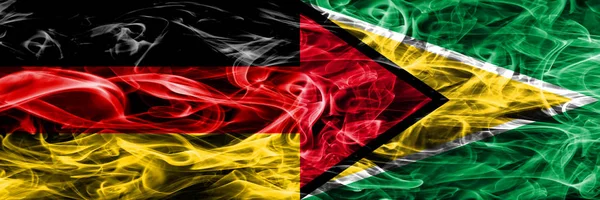 Německo Guyana Kouřit Příznaky Které Jsou Umístěny Vedle Sebe Německé — Stock fotografie