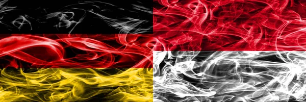 Германия Монако Дымовые Флаги Помещены Бок Бок Немецкий Монако Флаг — стоковое фото