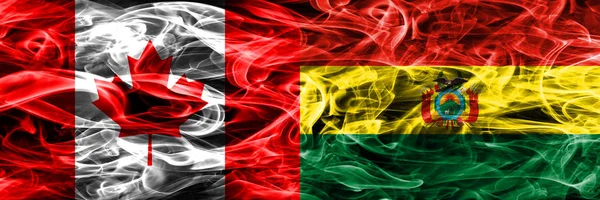 Bandeiras Fumaça Canadá Bolívia Colocadas Lado Lado Bandeira Canadense Bolívia — Fotografia de Stock